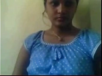 Inexperienced indian peels into abeyance web cam
