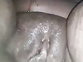 Fat clit African tot gets her blacked clit soaked in the Uganda waterfall